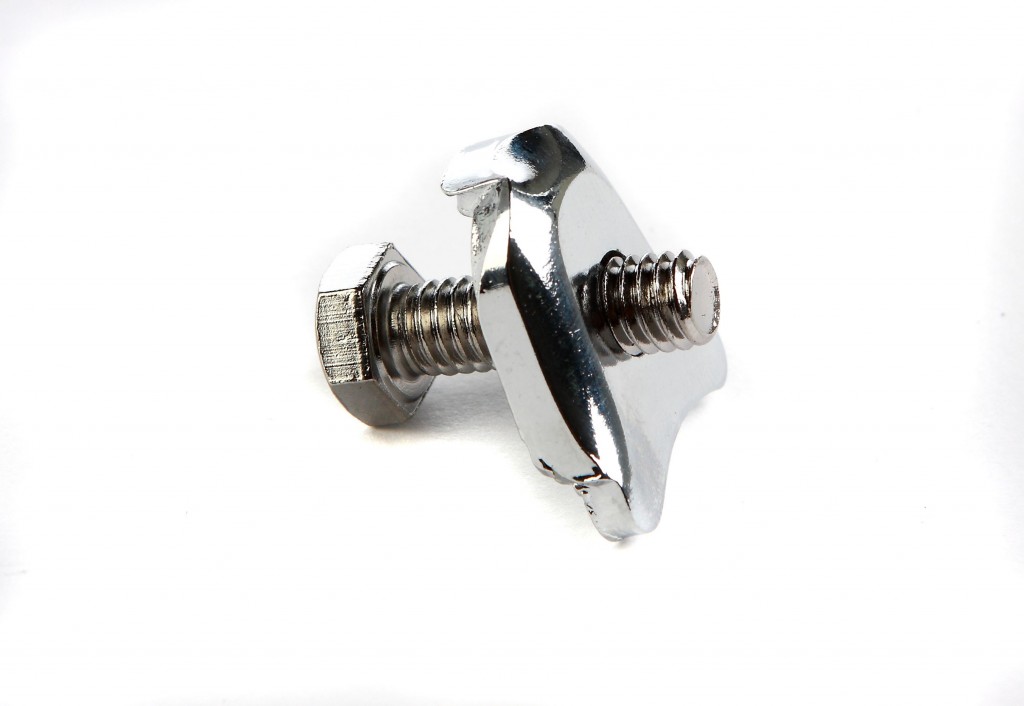 Distributor hold down